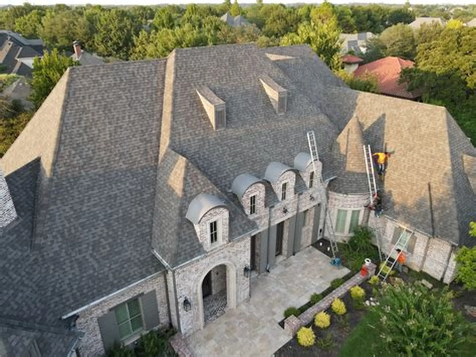 Aerial view of luxury roofing project in Texas